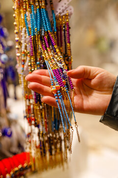 Selection of traditional colorful beads chain or gifts on display at a Turkish market in Grand Bazaar istanbul,Turkey