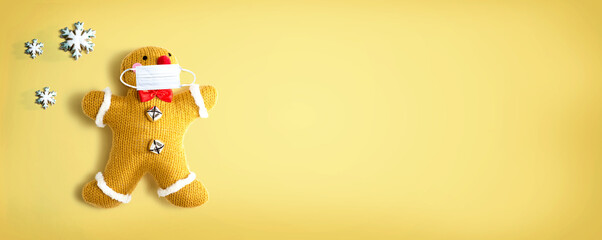 Gingerbread wearing a face mask - flat lay