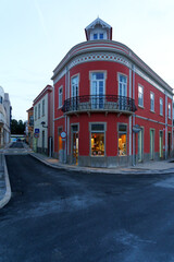 Naklejka premium old ornate structured building exterior and shop front of european origin