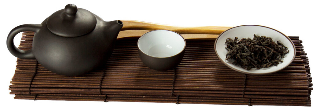 small clay teapot, tea and tea ceremony supplies without background