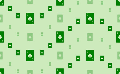 Seamless pattern of large and small green ace of clubs cards. The elements are arranged in a wavy. Vector illustration on light green background