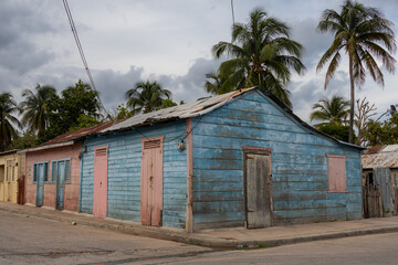 Pedernales, Dominican Republic, 22 august 2022. THe typical wooden dominican houses of the last century, made with wood and painted with bright colors.