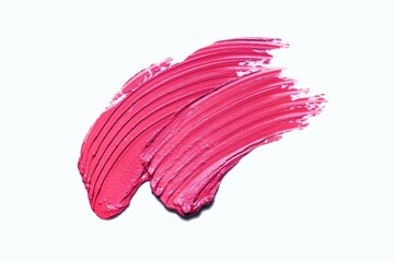 Cosmetic matte red pink lipstick smudge texture on white isolated background
