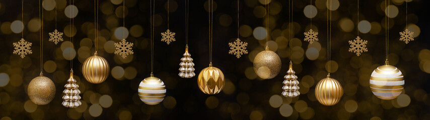 Christmas celebration holiday background banner template greeting card panorama - Group of hanging gold Christmas balls Christmas baubles, ice crystals and trees on dark night with golden bokeh lights