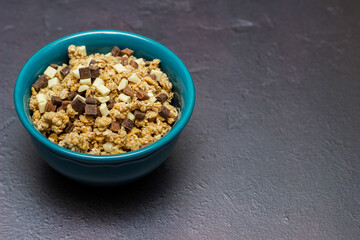 Obraz na płótnie Canvas Chocolate granola cereals in bowl
