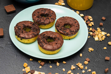 Sweet chocolate doughnuts on a plate