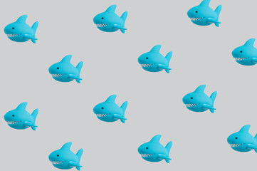 Pattern made of shark toys.