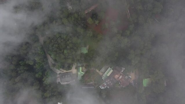 Drone descending through clouds in Haiti