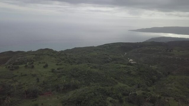 Drone footage of the Caribbean sea on a cloudy day in Jacmel, Haiti