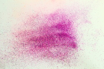 Colorful diwali holi festival rangoli purple color powder with isolated on white background,selective focus