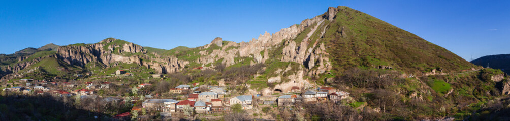 Fototapeta na wymiar Top view of the town of Goris and the Medieval Goris Cave Dwellings on its outskirts. Armenia