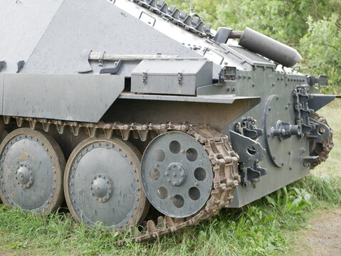 German light self-propelled artillery installation of the Second World War. An armored vehicle with a camouflage dark gray color on a forest road.