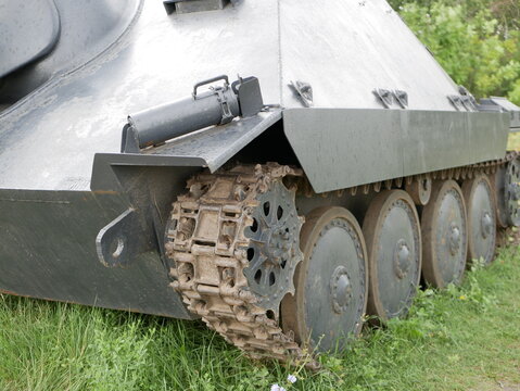 German light self-propelled artillery installation of the Second World War. An armored vehicle with a camouflage dark gray color on a forest road.