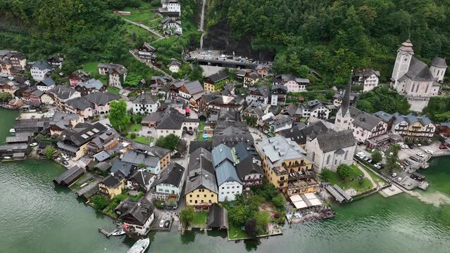 Hallstatt municipality in the Austrian state of Upper Austria , located in the district of Gmunden. Touristic recreational sight destination. Ancient small alp salt mine village in Austria.