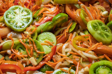 Homemade food. Marinated tomatoes with carrot. Preservation. Marinated tomatoes.