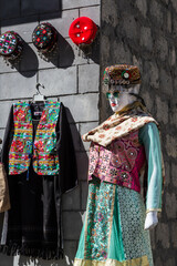 Traditional colourful Hunza clothes on display outside a shop. Pass, Hunza-Nagar, Pakistan