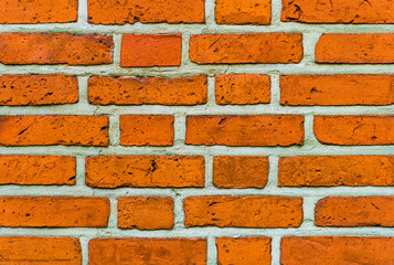 Obraz premium Textured red old brick wall with cracks. Background.
