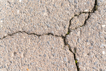 Stone wall brick texture with a crack