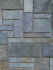 Surface laid with gray granite slabs cut to various sizes.