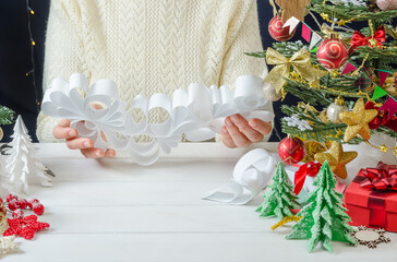 Step-by-step photo instructions for making Christmas paper decor, step 4 - ready-made openwork holiday decorations for the home