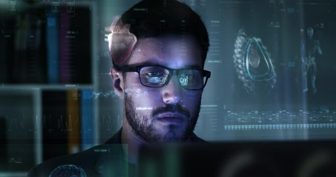 Young Caucasian Male Using Computer With Holographic Animated Medical MRI, 3D Models and Patient Data. Doctor Checking Patient Information at Night in Office. VR, AR. Graphic User Interface.