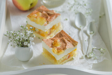 Sweet tart with apples with fresh fruits and cinnamon.
