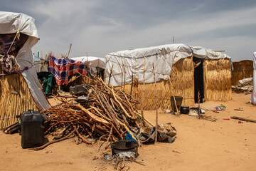 Refugee camp in Africa, full of people who took refuge due to insecurity and armed conflict. People living in very poor conditions, lack of food, clean water and proper shelter to stay in
