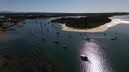 Aerial drone shot of numerous boats near Port Macquarie, NSW, Australia