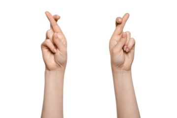 Woman's hand at which fingers are crossed