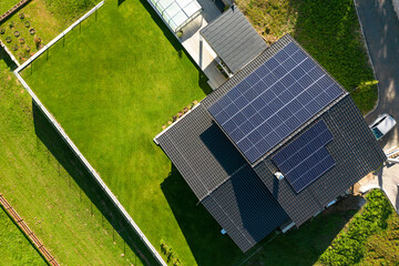 Top view of solar photovoltaic panels on roof, alternative energy, saving resources and sustainable...