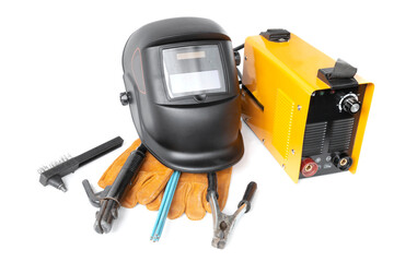 Fototapeta premium Inverter welding machine and mask, Electrode welding equipment on a white background