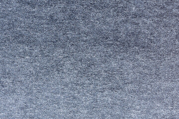 macro photography of silver spray paint on white paper