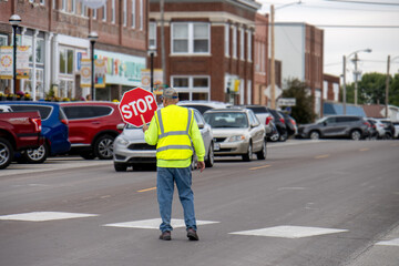 crossing guard with stop sign