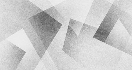 modern abstract black and white background design with layers of textured gray transparent material in triangle diamond and squares shapes in random geometric pattern