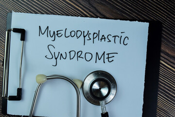 Concept of Meylodysplastic Syndrome write on paperwork with stethoscope isolated on Wooden Table.