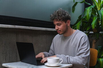 young businessman working in cafe,working culture in cafe