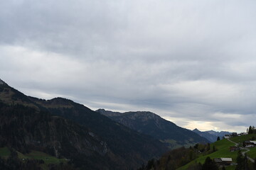 Naklejka premium clouds over the mountain