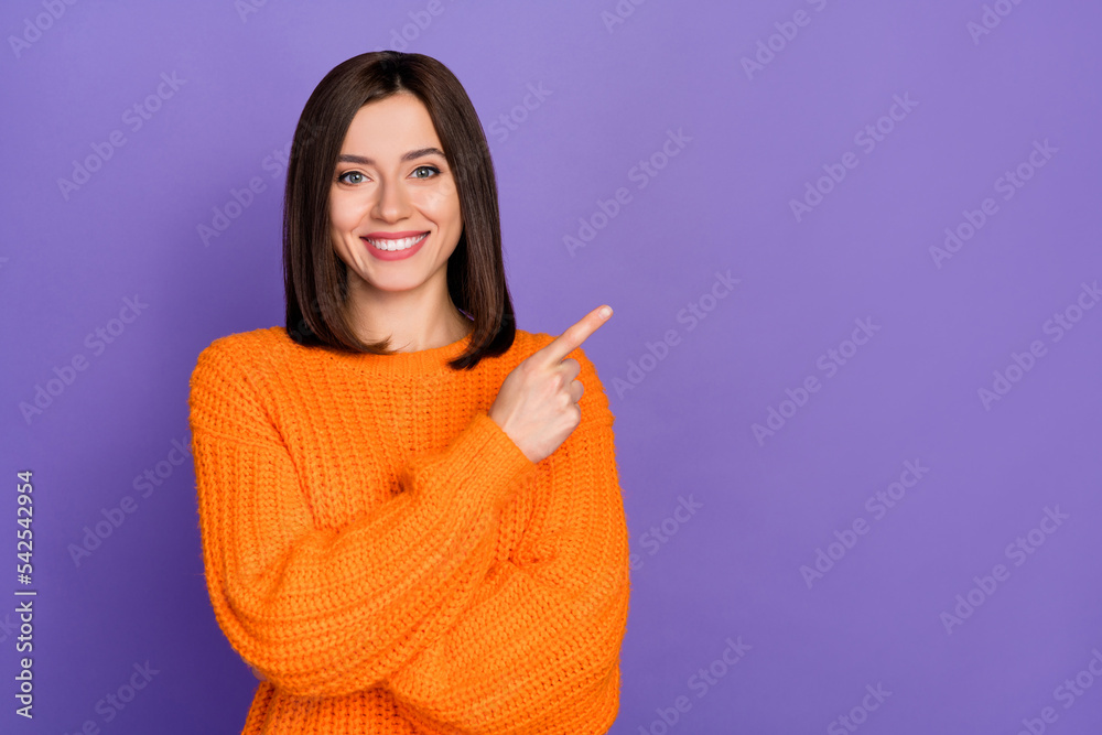 Sticker Photo of cheerful pretty person indicate finger empty space novelty isolated on violet color background