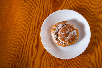 Ensaimada with cream, spiral pastry typical of Mallorca