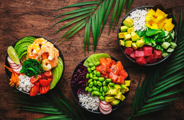 Hawaiian poke bowl set: tuna, salmon, shrimp with avocado, mango, radish, rice and other...