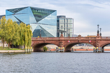 River Spree with the Moltke Bridge and the Cube Berlin, Germany