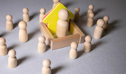 Person isolating in solitude separated behind a wall concept