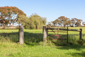 old rural gate and field
