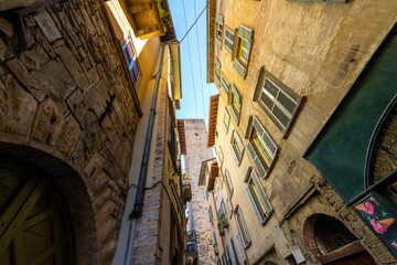 Fototapeta na wymiar A picturesque narrow alley in the historic medieval old town walled Città Alta district, in the city of Bergamo, Italy, in the Lombardy region.