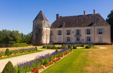 Fototapeta na wymiar Picturesque summer view of Castle of Saint-Maur located in Argent-sur-Sauldre, in department of Cher, region Centre-Val de Loire, France