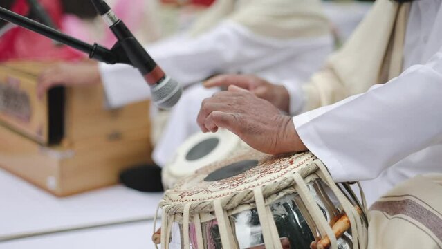Man Playing Traditional Indian Classical Musical Instrument Tabla. Indian twin hand drums