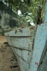 wooden boats in the Indonesian area by taking pictures from below and seeing the side of the wooden boat