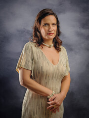 studio portrait of hispanic or brazilian 40s woman