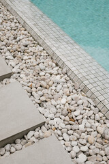 swimming pool with path and white stones