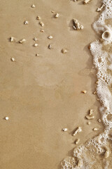 Wave of the sea on the sand beach